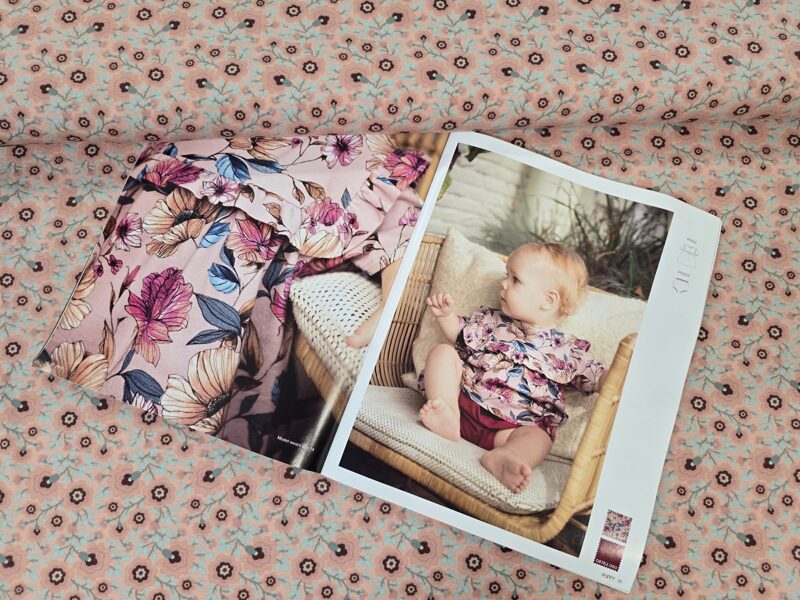 Brownish flowers on pink, cotton jersey 